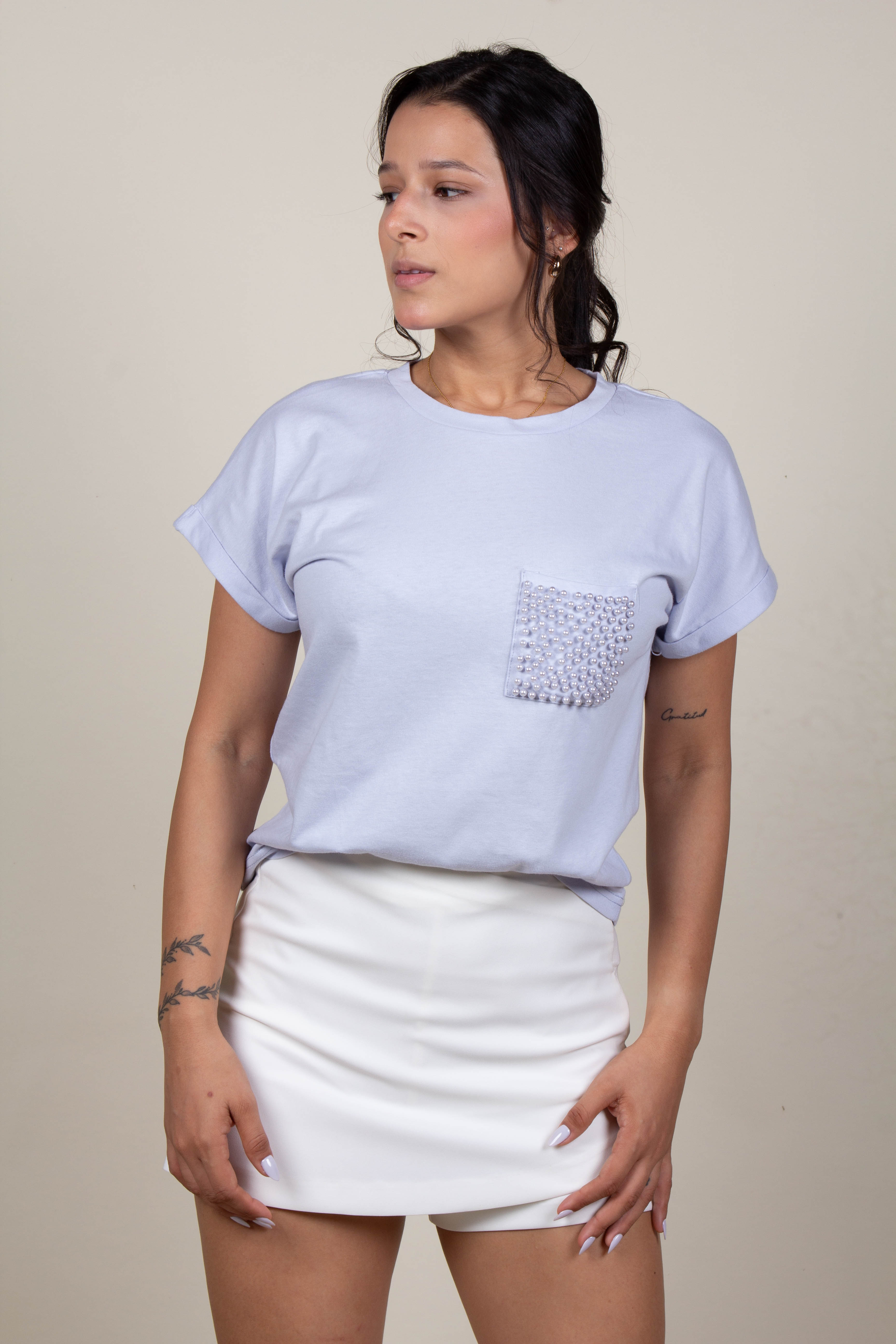 Blusa celeste pedreria en bolsa