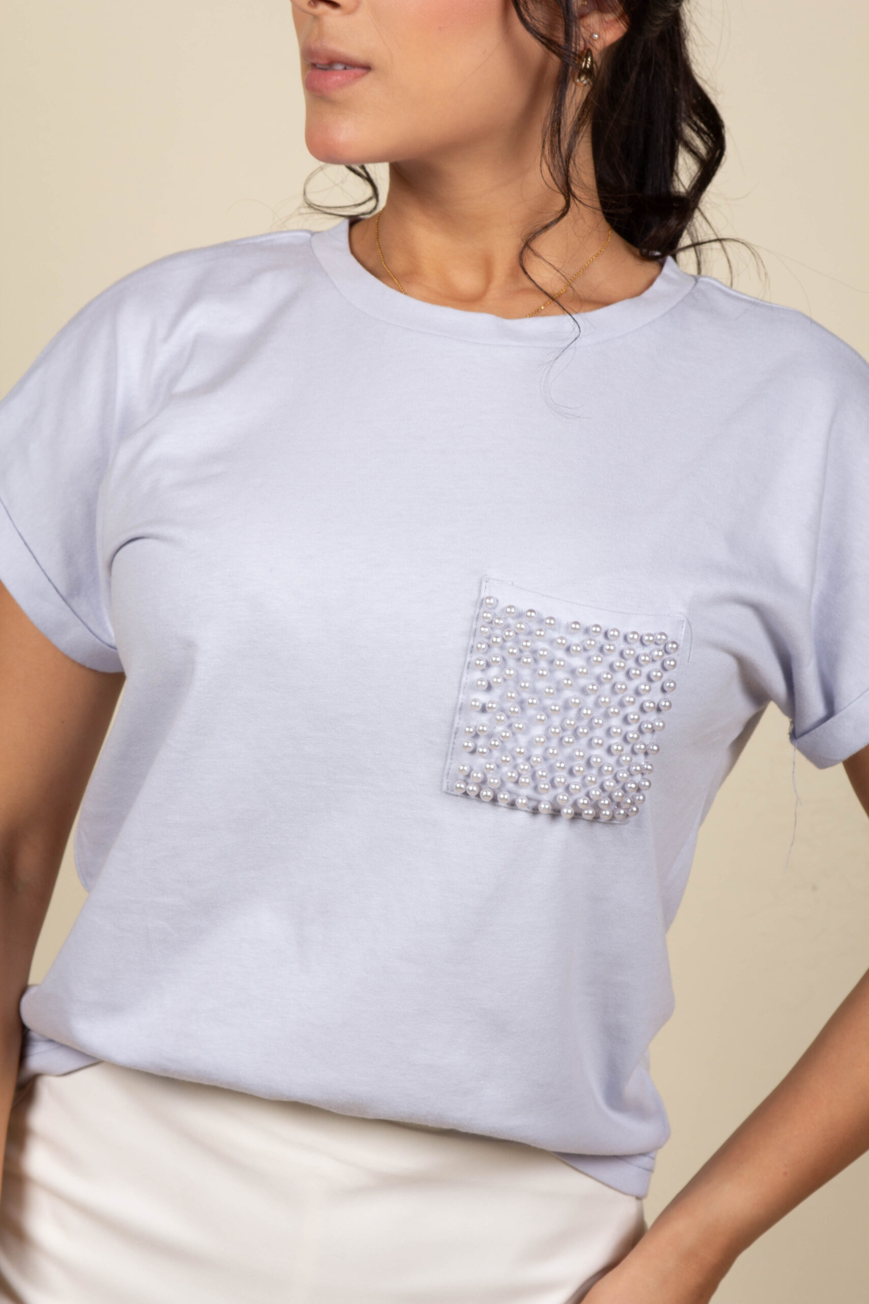 Blusa celeste pedreria en bolsa