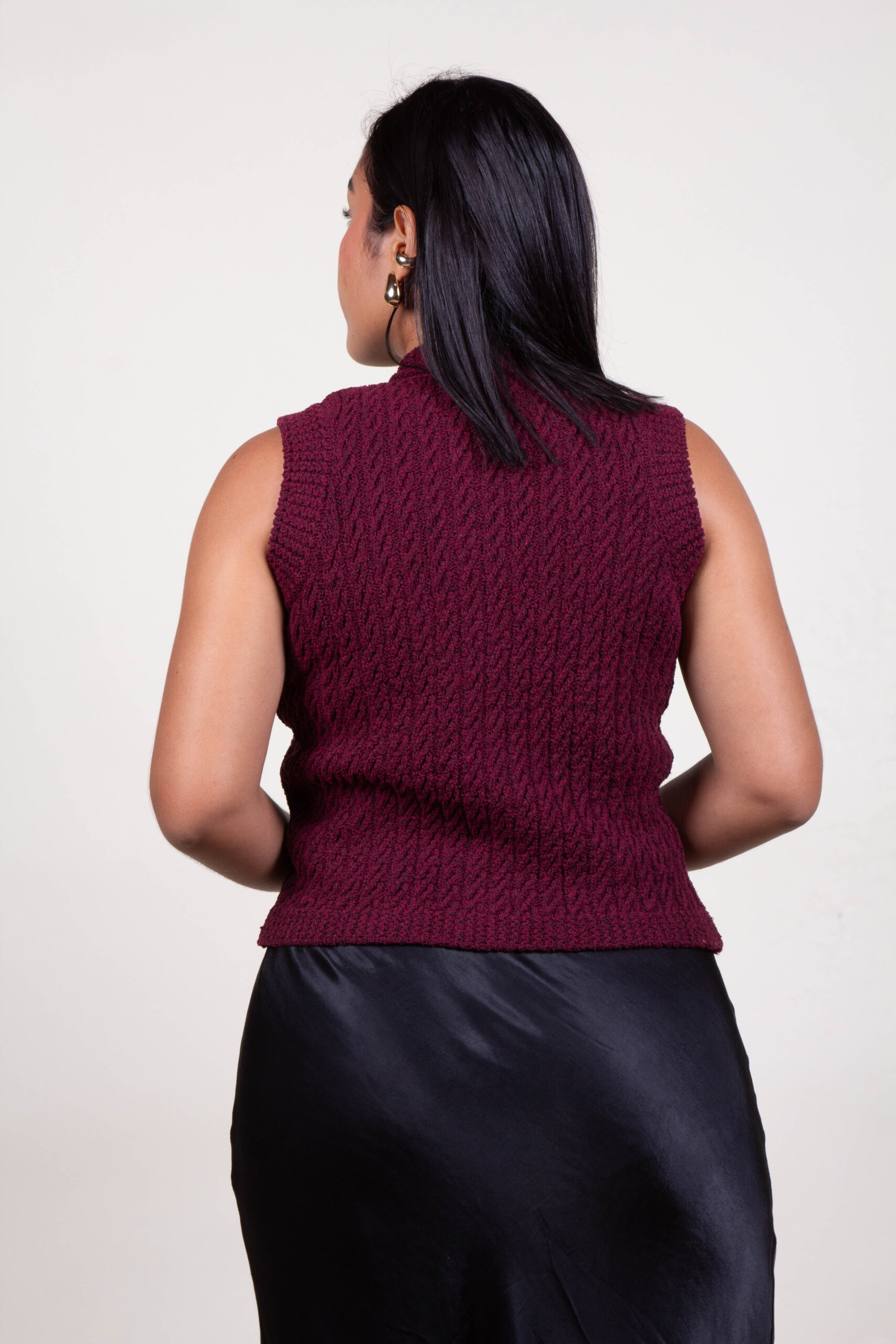 Chalecos con botones dorados