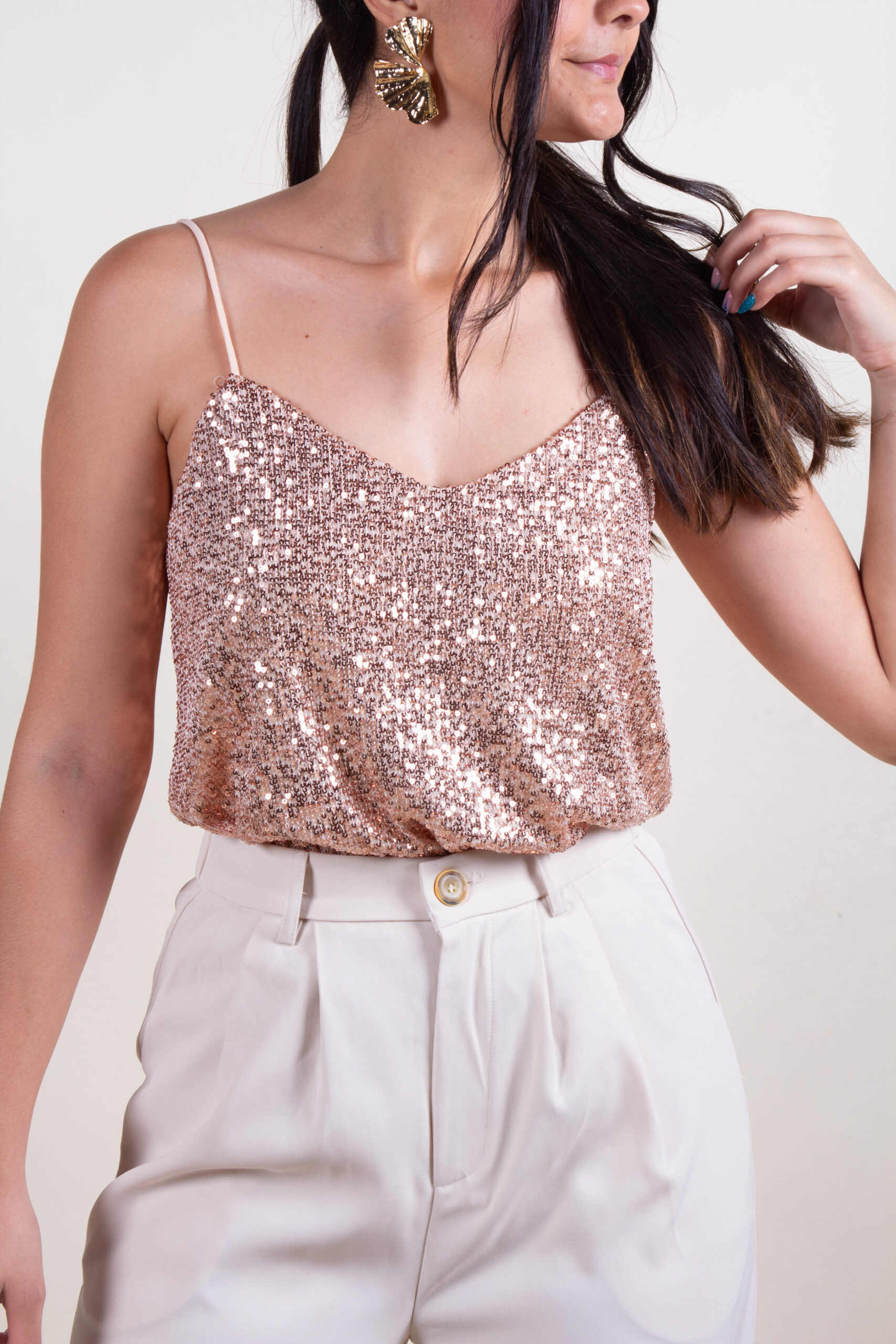 Blusa de lentejuelas dorada