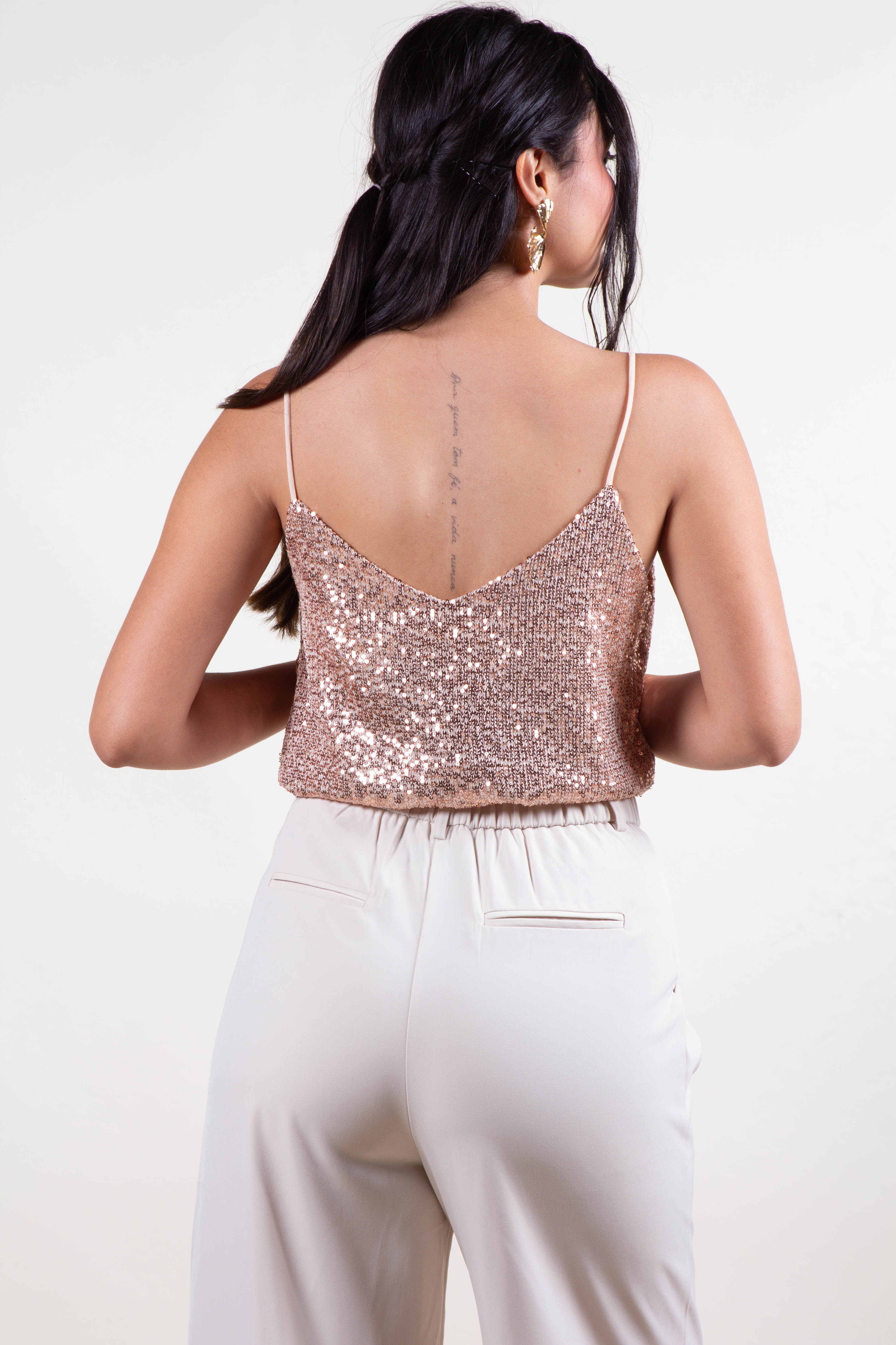 Blusa de lentejuelas dorada