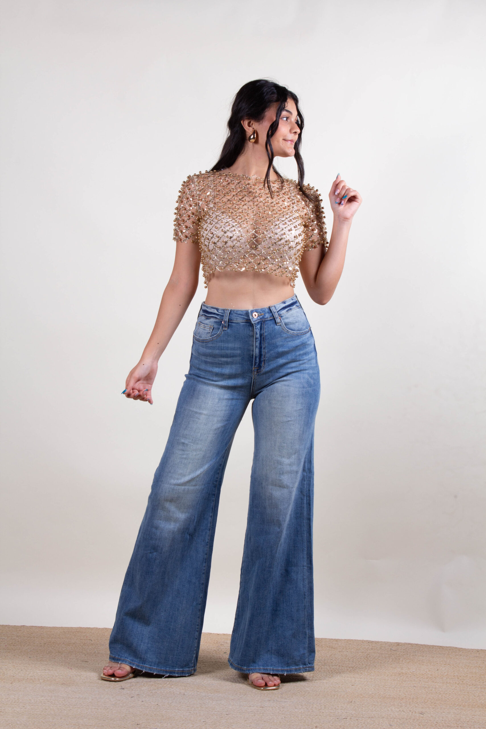 Blusa de lentejuelas y perlas