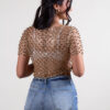 Blusa de lentejuelas y perlas