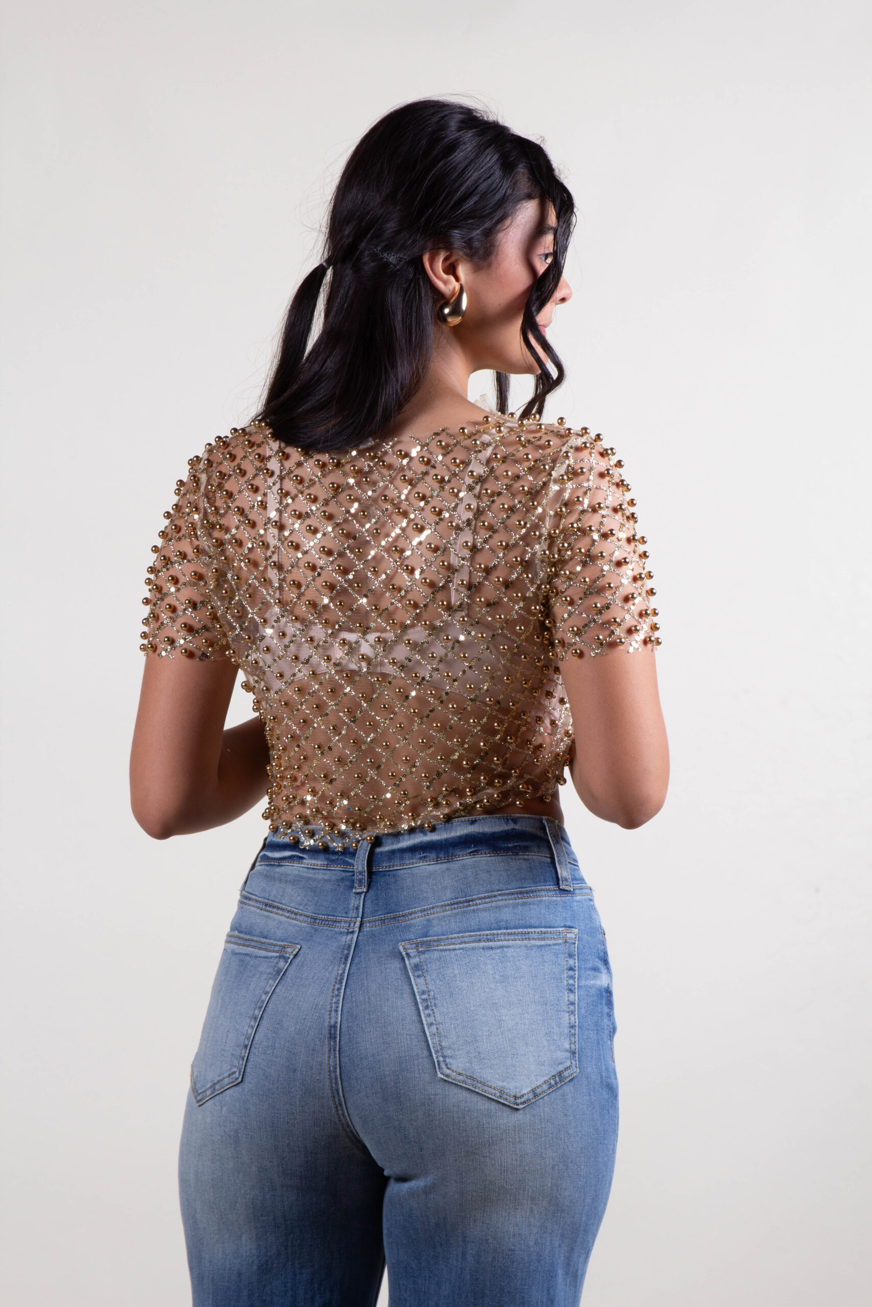 Blusa de lentejuelas y perlas