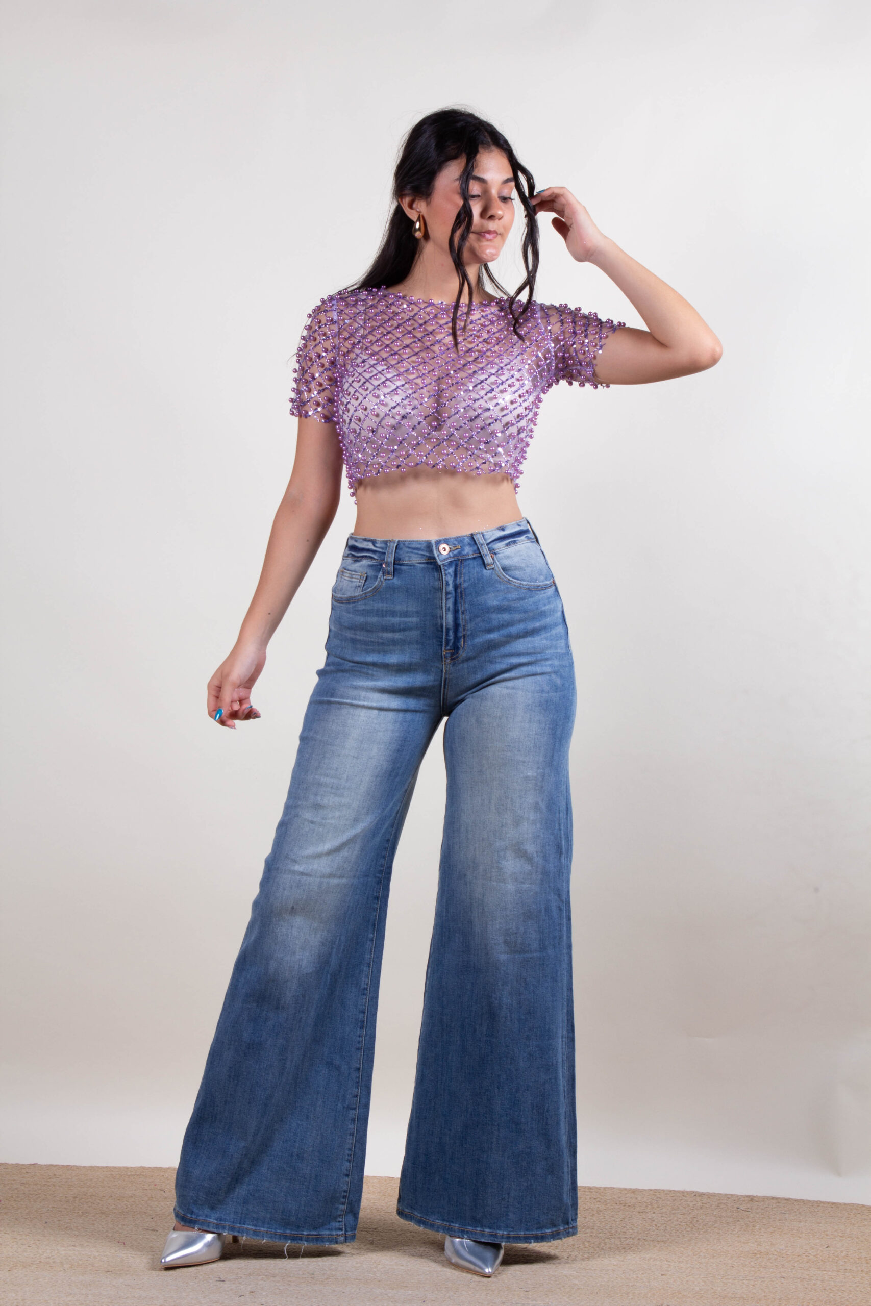 Blusa de lentejuelas y perlas