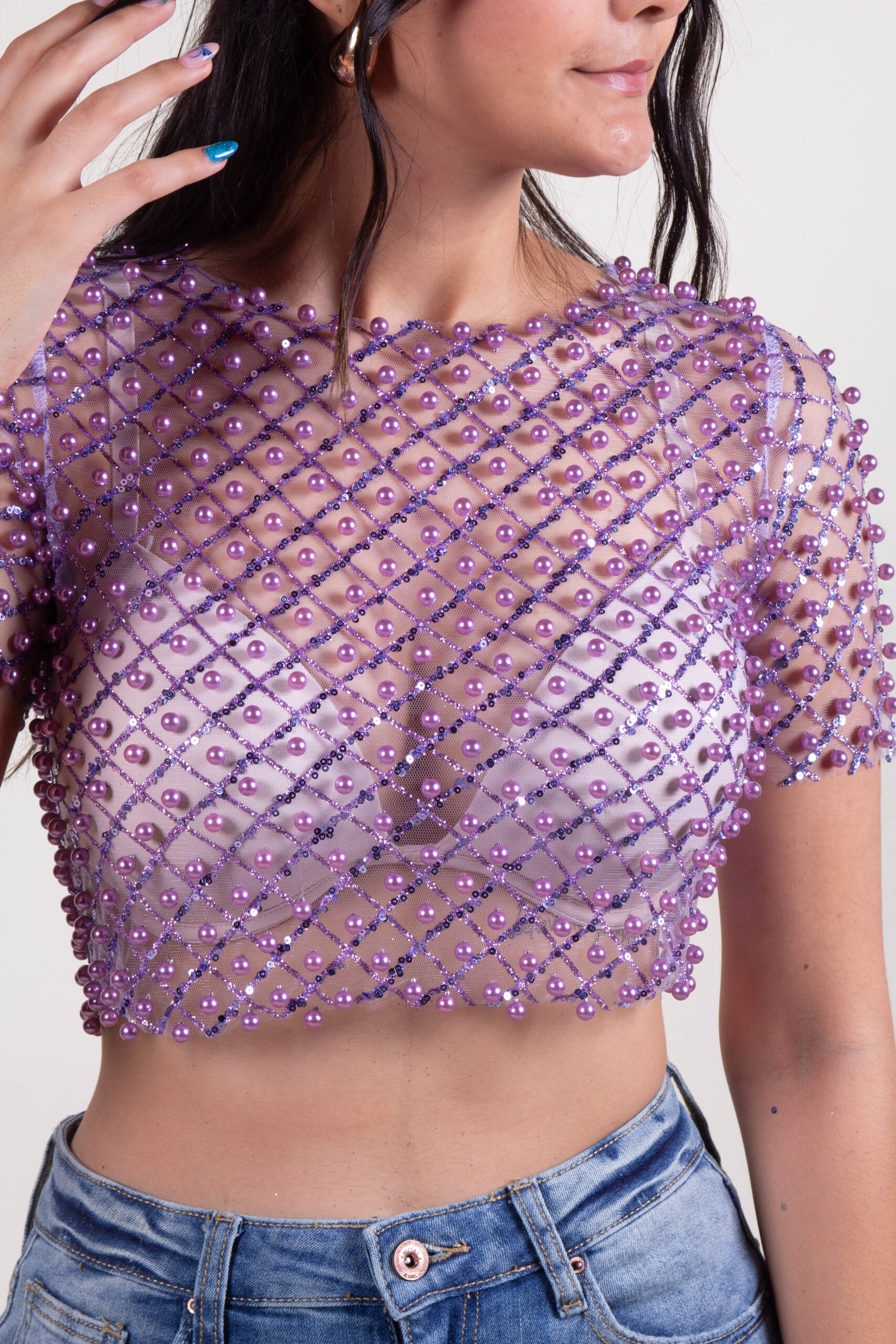 Blusa de lentejuelas y perlas