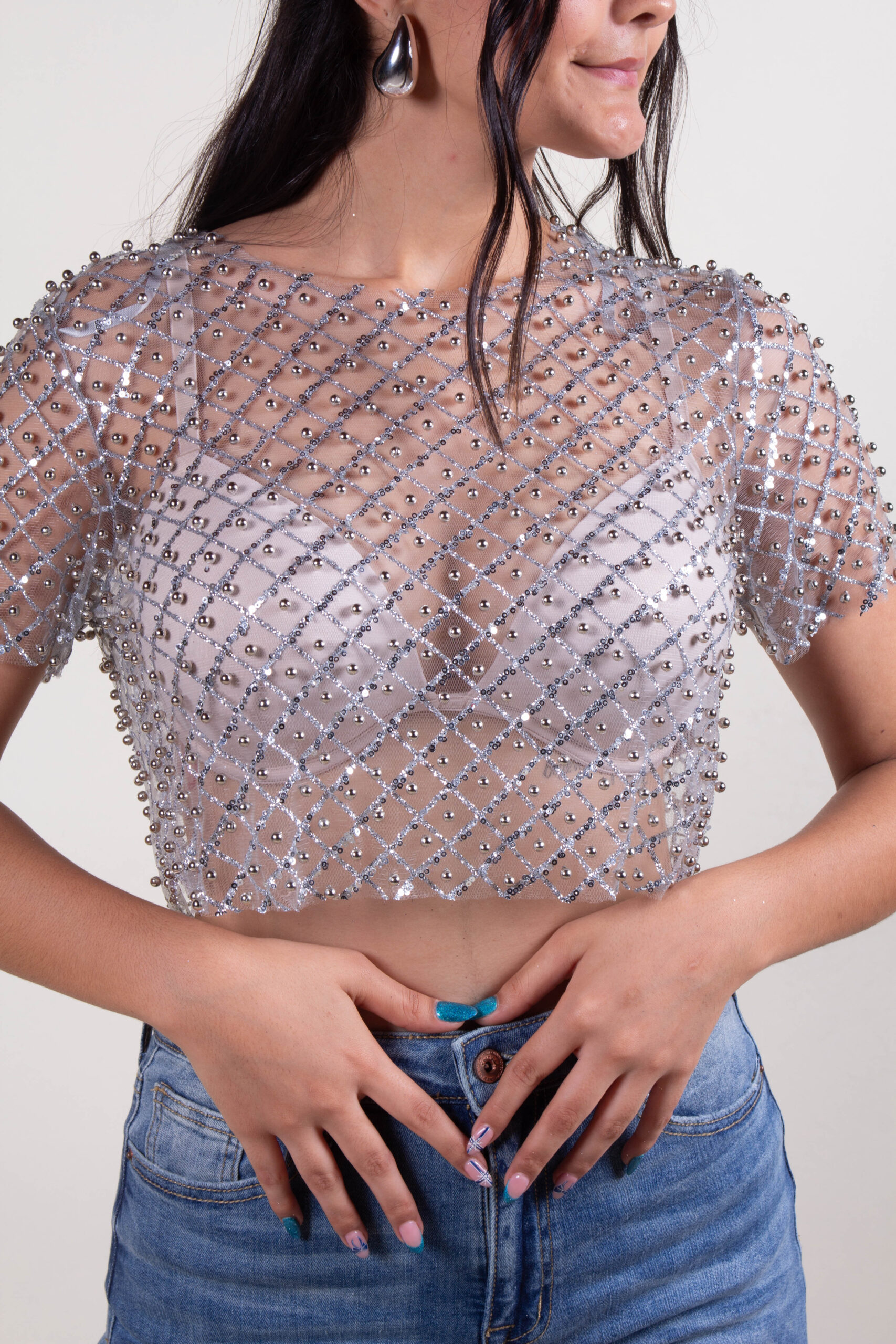 Blusa de lentejuelas y perlas