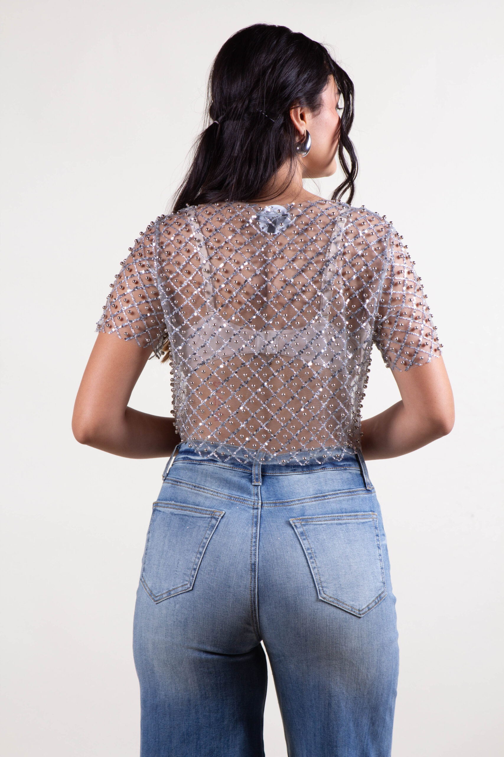 Blusa de lentejuelas y perlas