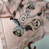 Pañoleta rosada estampada