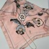 Pañoleta rosada estampada