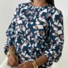 Blusa turquesa estampada